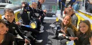 Un centenar de escolares se sumergen para conocer la importancia de la posidonia y del entorno marino
